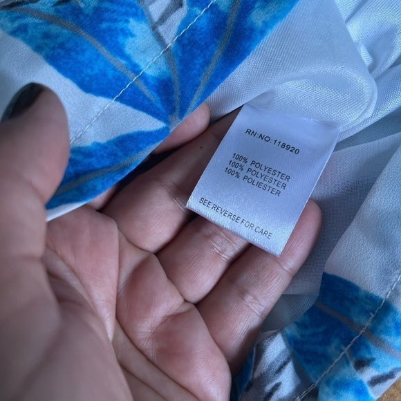 2/40$
Jieru onepiece tropical long sleeve white and bleu size medium - Picture 6 of 14